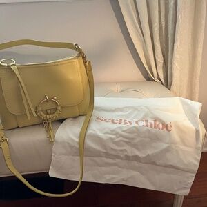 Yellow with gold hardware See by Chloe Joan bag